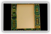 Green frame:
Made of art glass, mirrored glass, murrine, gold and glass pearls
Size: 24x19 outside dimension (for photo 13x18 cm)
                       21x 15.5 (for photo 10x15cm)
                       17x15 (for photo 9x11 cm)
