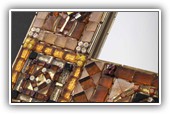 Bronze table mirror or frame:
Made of art glass, mirrored glass, murrine, glass pearls, gold, silver
size: 26x32 cm - border 5 cm
